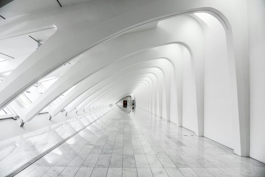 a long hall way in a modern designed building illustrating the relation of psychology and requirements engineers