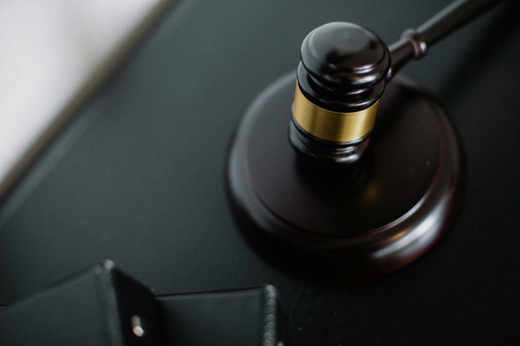 A judge's gavel illustrates legal and regulatory documents in requirements engineering