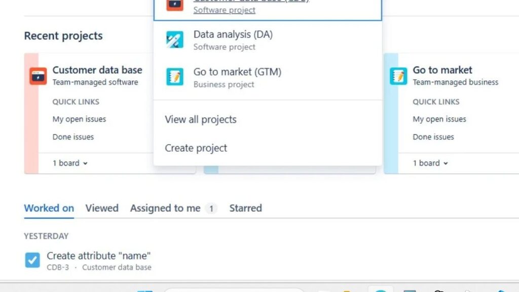 Jira screen showing a project dropdown with items like “Data analysis (DA)” and “Go to market (GTM),” plus “View all projects” and “Create project.”